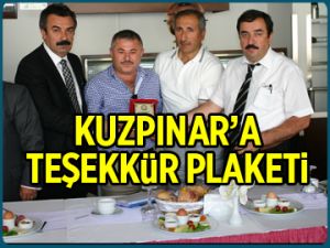 Kuzpınar’a teşekkür plaketi